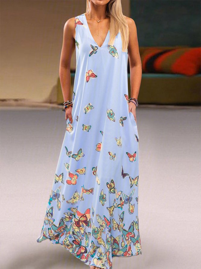 white maxi dress with butterflies