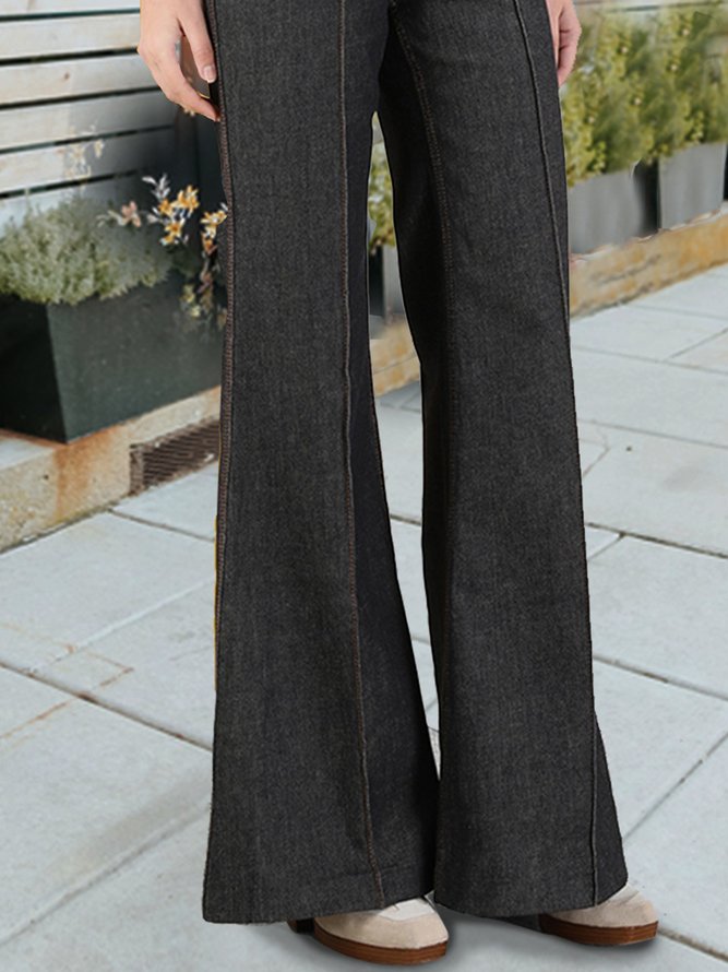 Black slim and long flared jeans