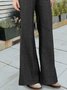 Black slim and long flared jeans